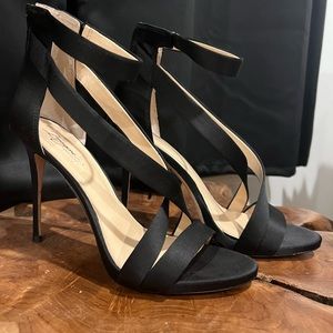 Black satin dress shoes. Skinny heels, super comfortable.